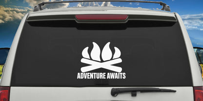 Adventure Awaits decal applied to a truck rear window