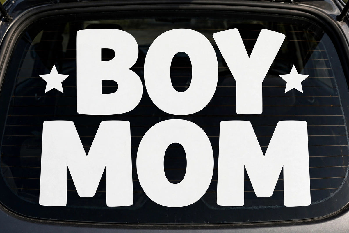 Boy Mom decal applied to a truck rear window