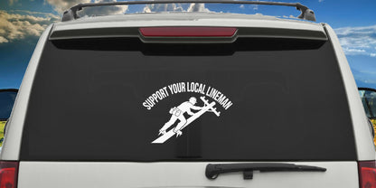 Lineman decal applied to a truck rear window