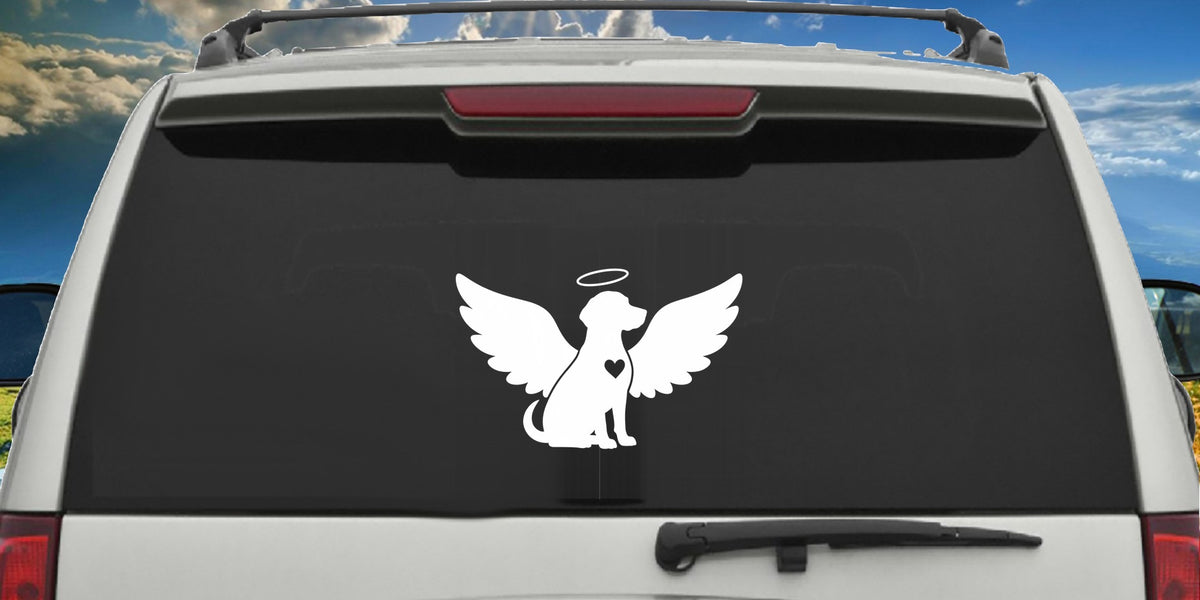 Dog Memorial decal applied to a truck rear window