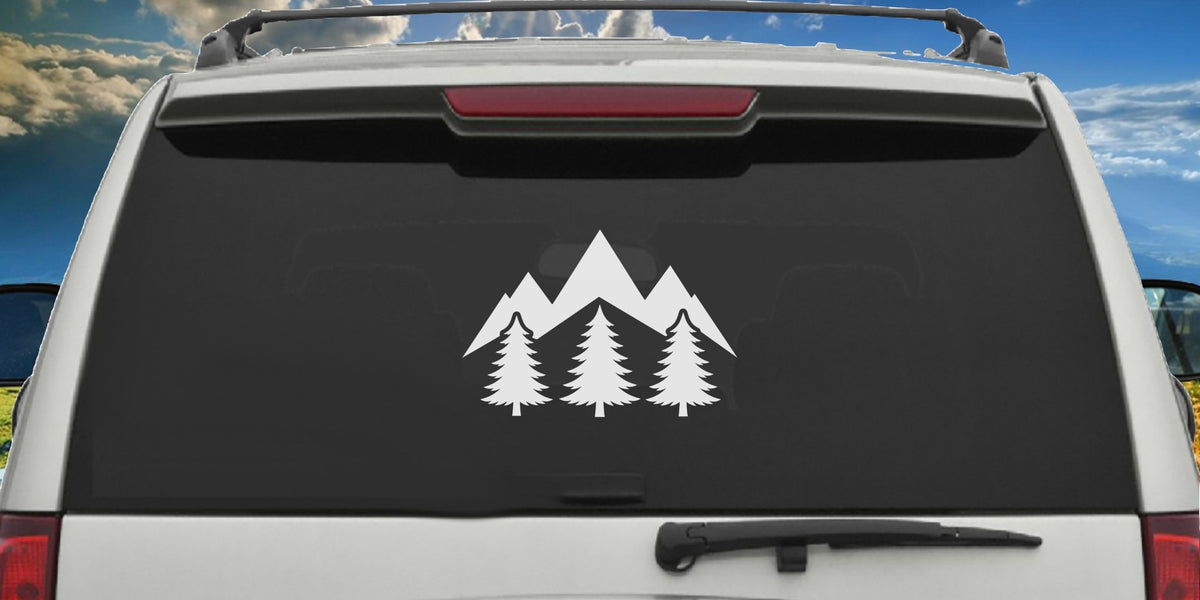Pine Tree Mountain decal applied to a truck rear window