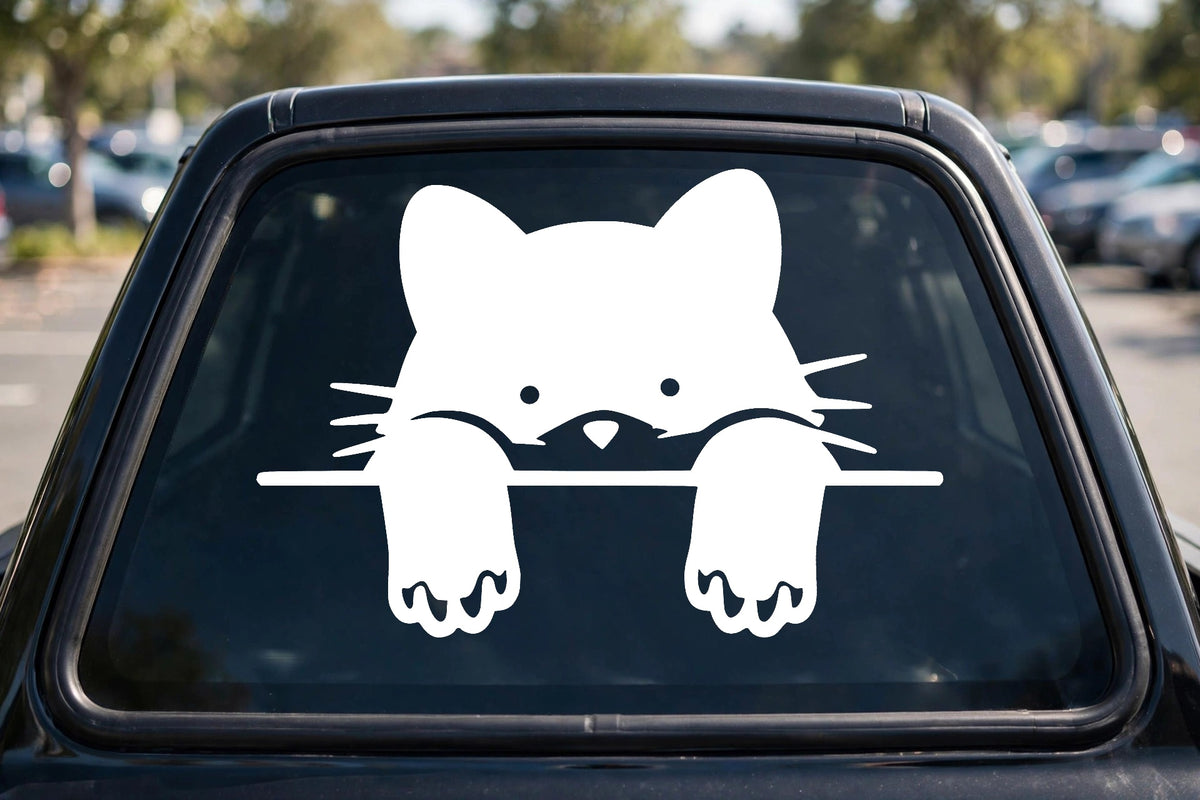 Peeking Cat decal applied to a truck rear window