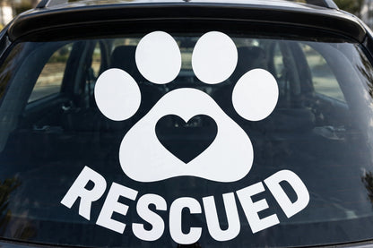 Rescued Paw decal applied to a truck rear window