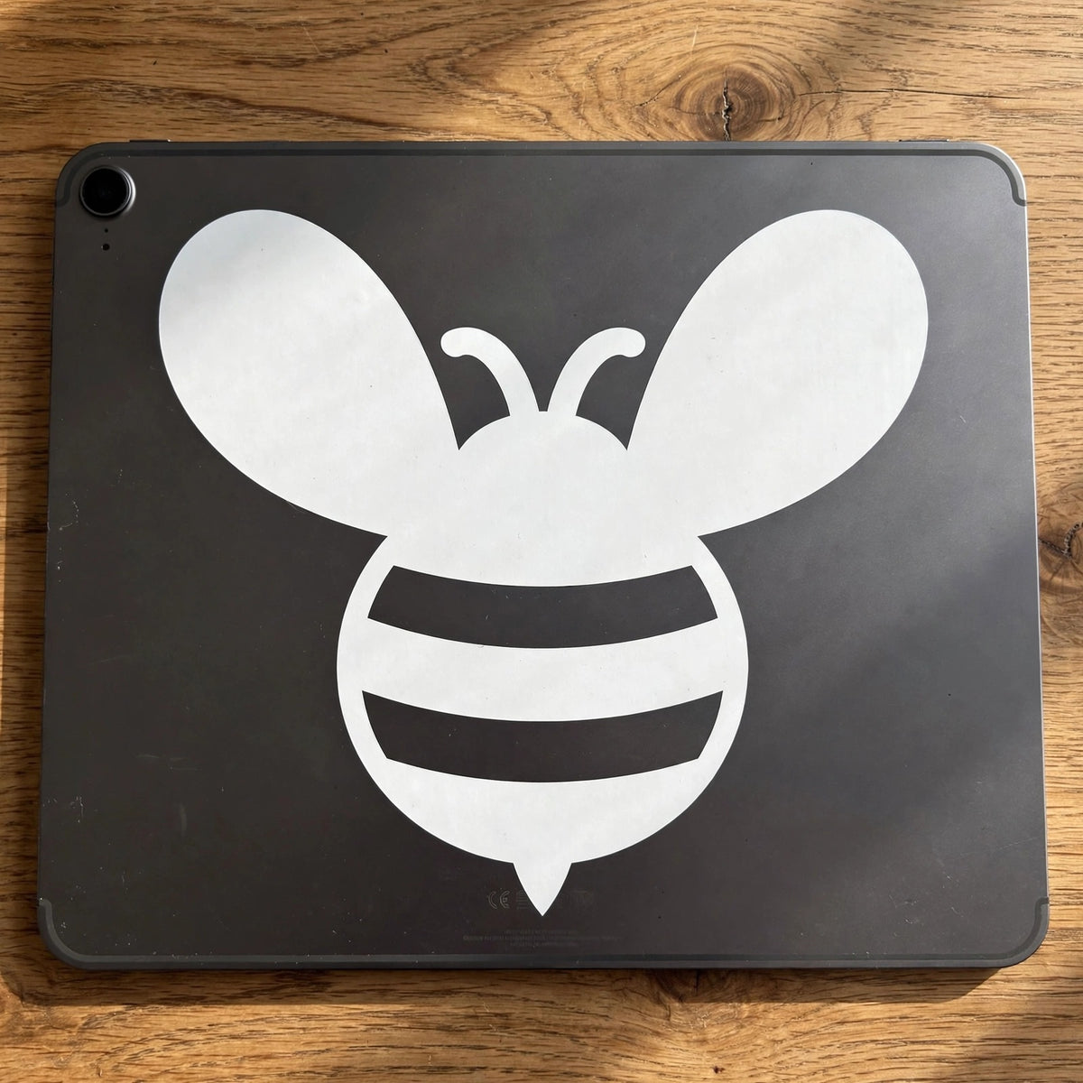 Bee decal applied to a tablet back