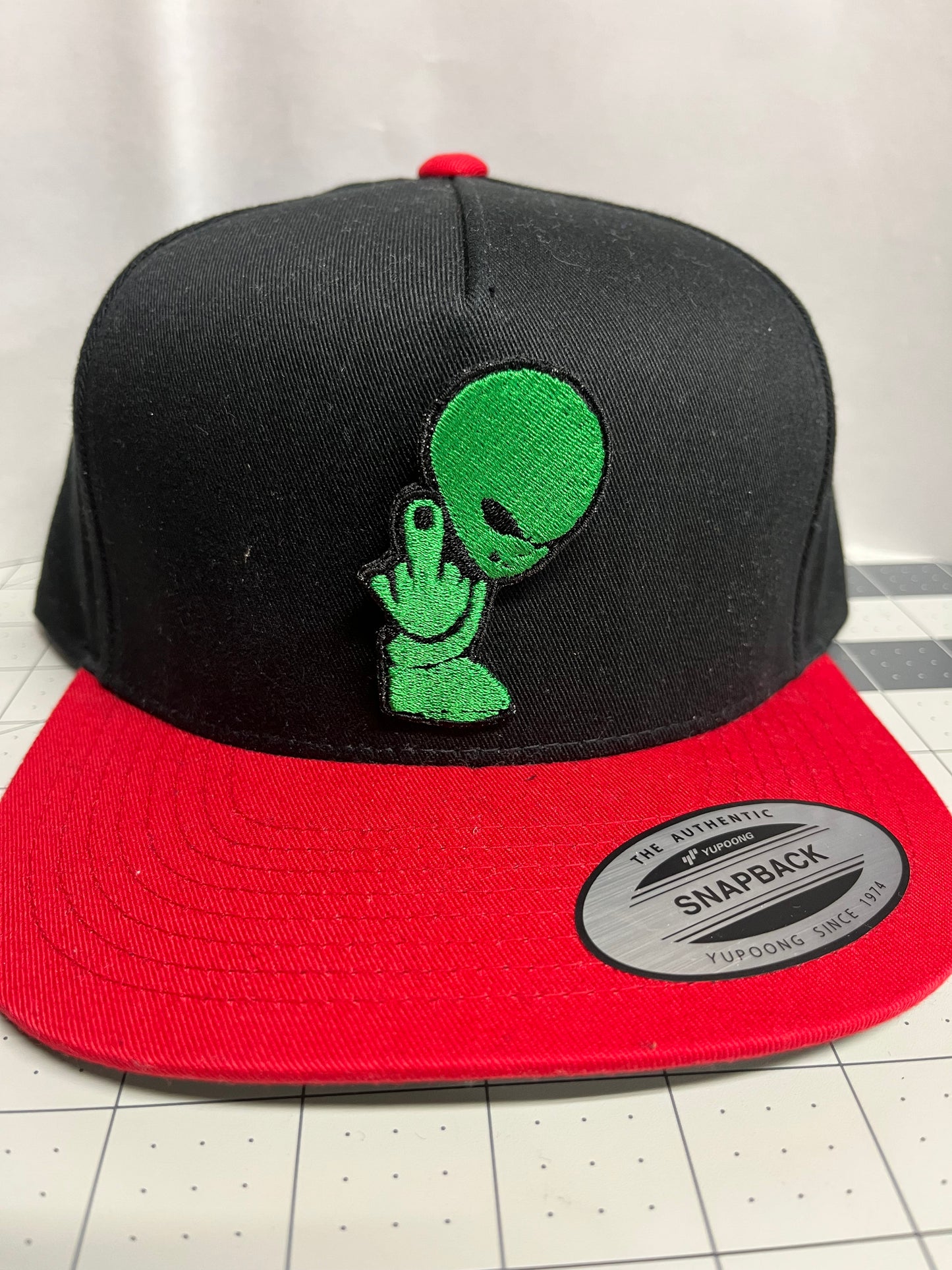 Embroidery Green Alien giving the middle finger, Yupoong Classics Flat Bill Cap